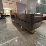 Luxury Deep Brown Textured TV Stand with Marble Top, Gold Metal Base and Orange Interior Drawers